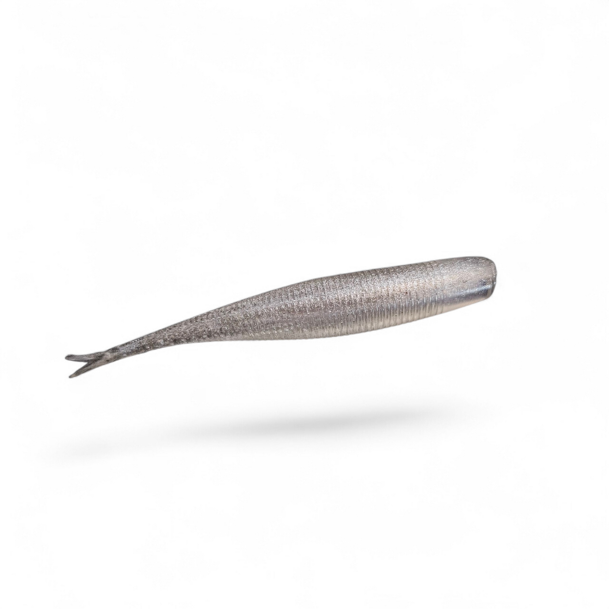 Limestone Softbaits 3.2-inch Tac Shad finesse bait with detailed body and tail for fishing lure, shown in an outdoor setting.