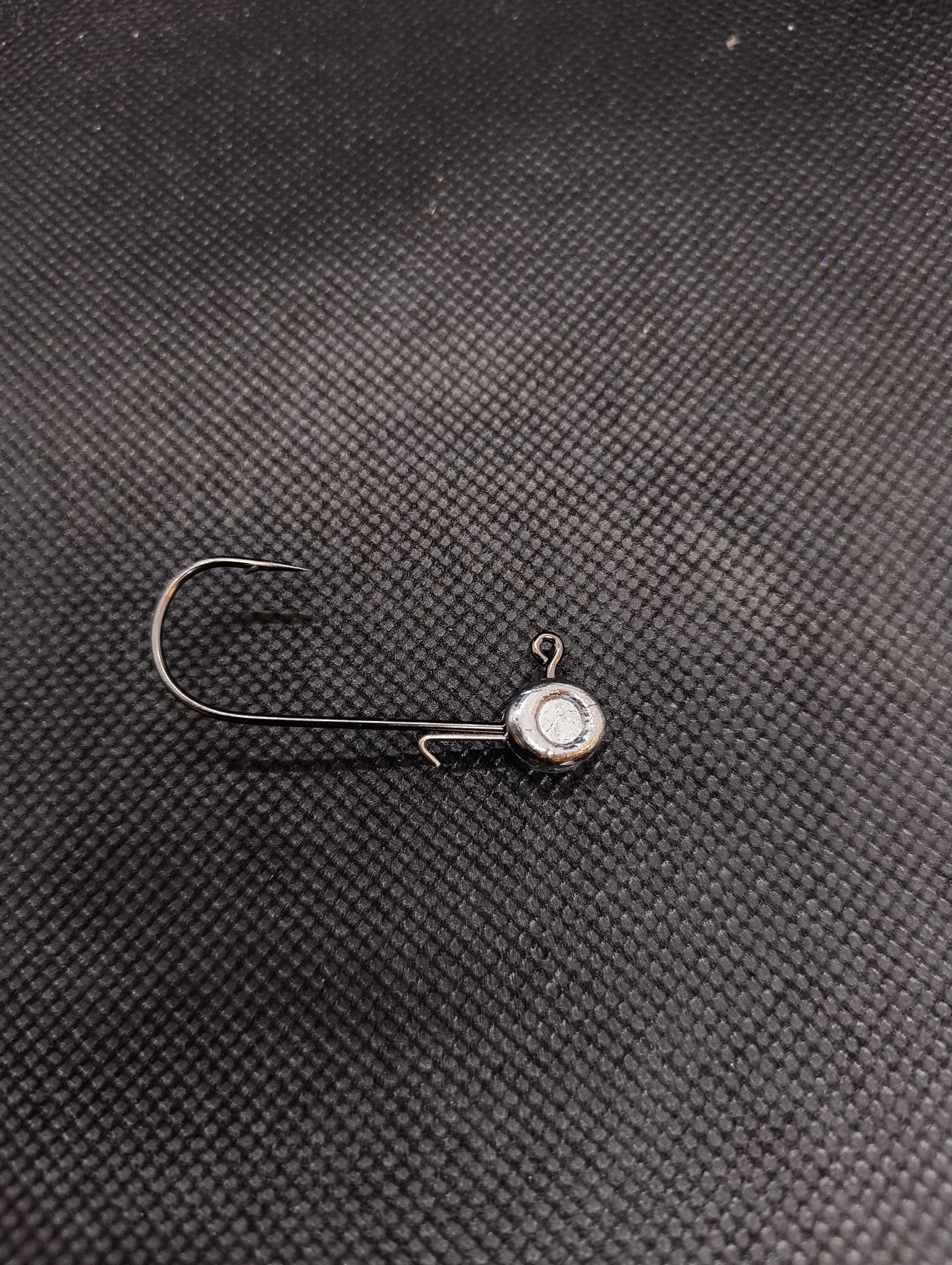 Limestone Softbaits Shadshaker jig with realistic shad shape and detailed coloring for freshwater fishing.