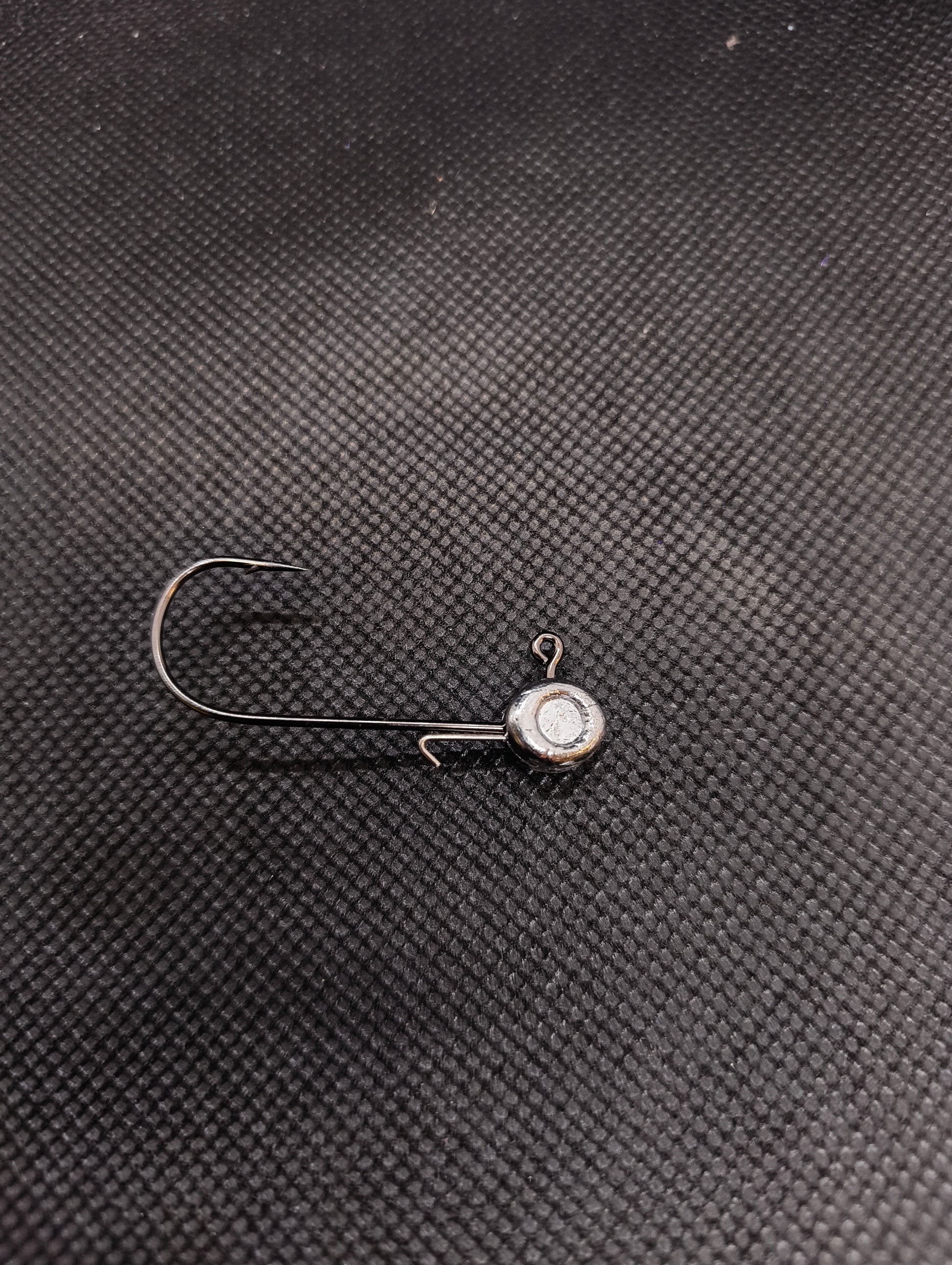 Limestone Softbaits Shadshaker jig with realistic shad shape and detailed coloring for freshwater fishing.