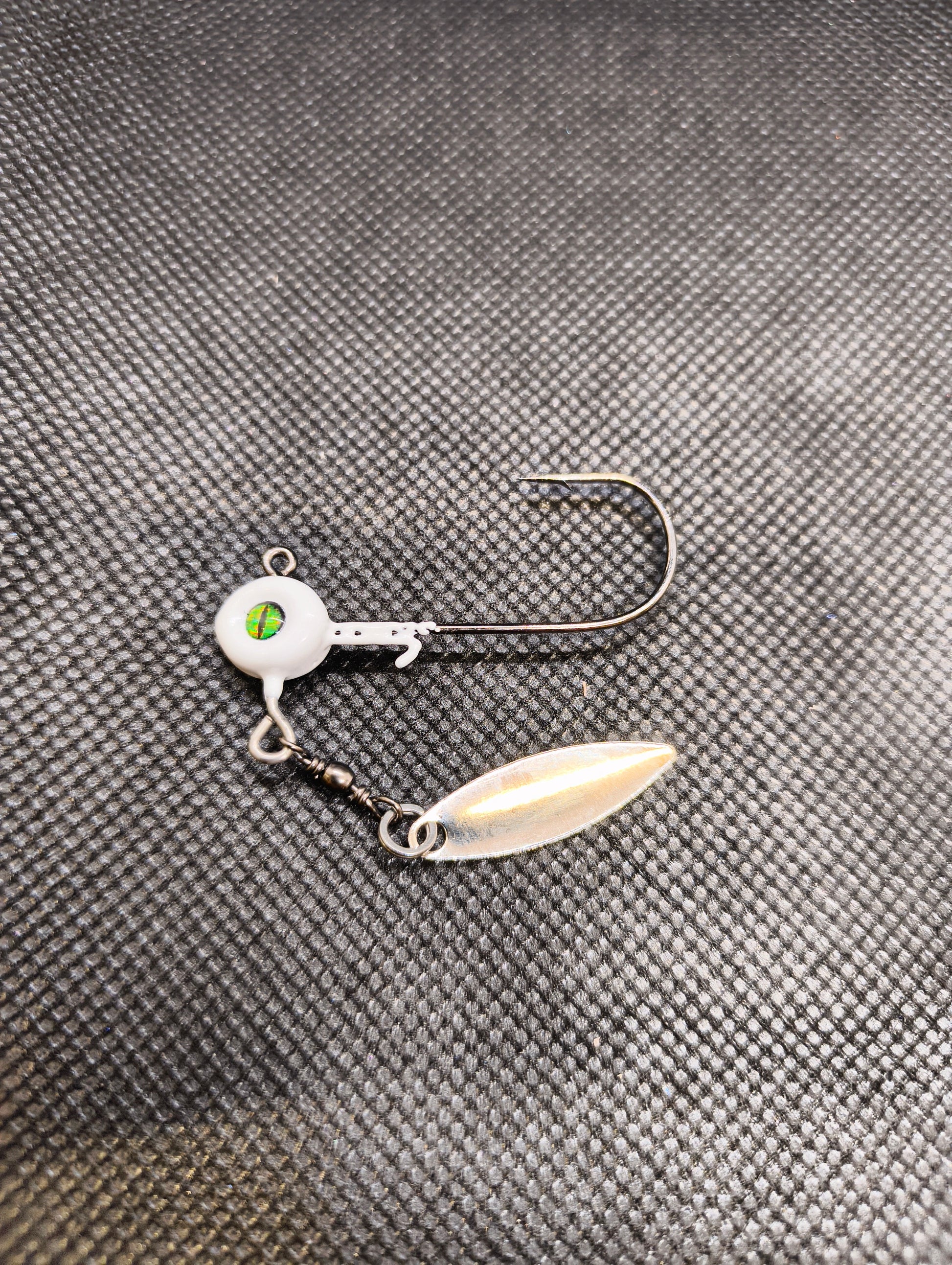Limestone Softbaits Jiggskalle underspin fishing lure with a shiny, reflective surface and realistic bait design for freshwater fishing.