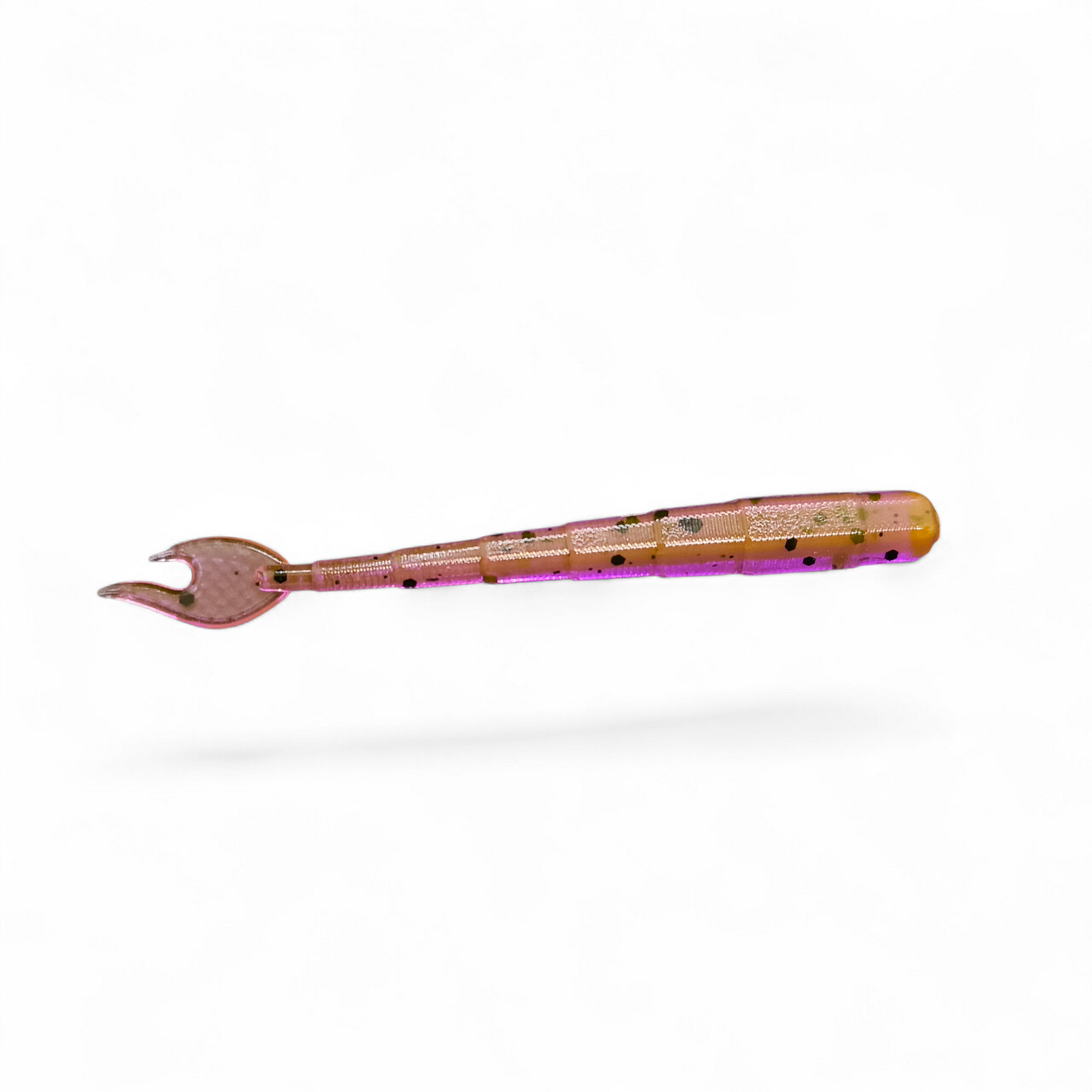 Limestone Softbaits Flaming Ned 4-inch soft plastic lure with bright flaming orange and yellow colors, ideal for fishing.