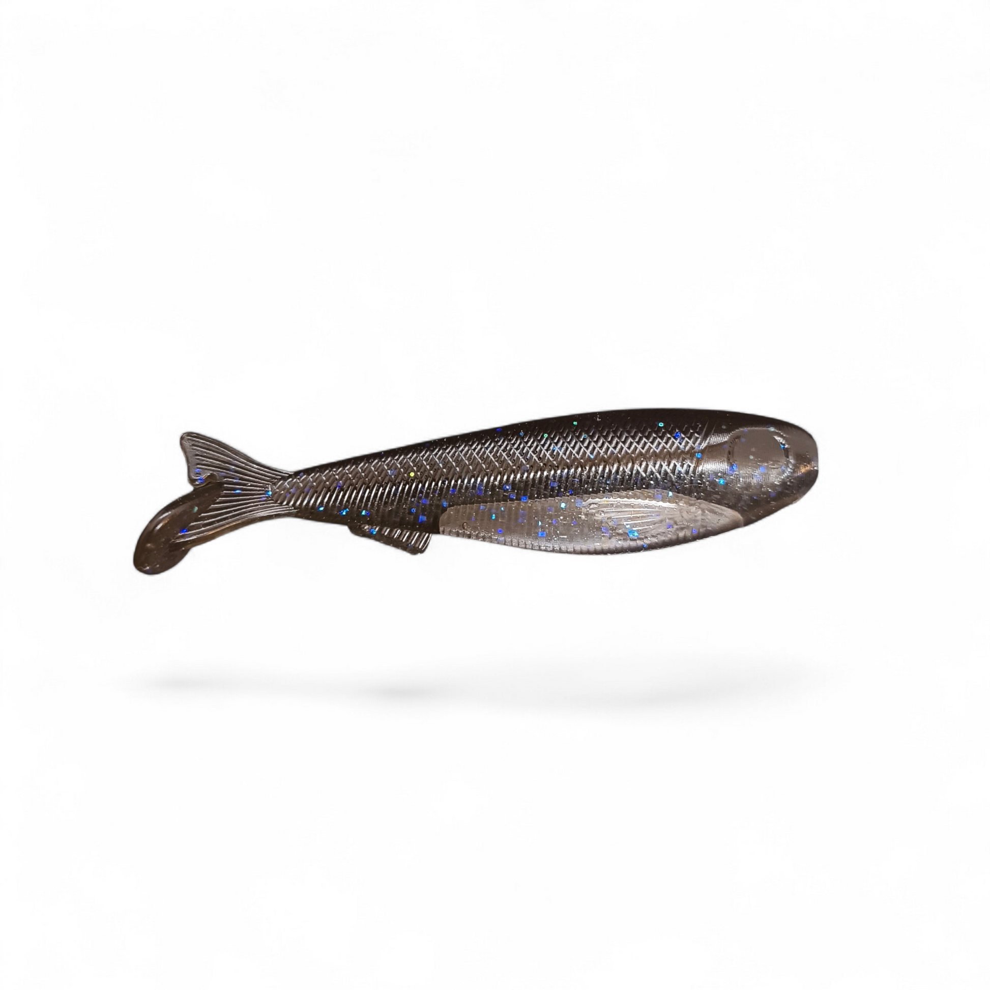 Limestone Softbaits 3.3-inch Slaybait swimbait in natural fish-like color, designed for fishing and lure fishing techniques.