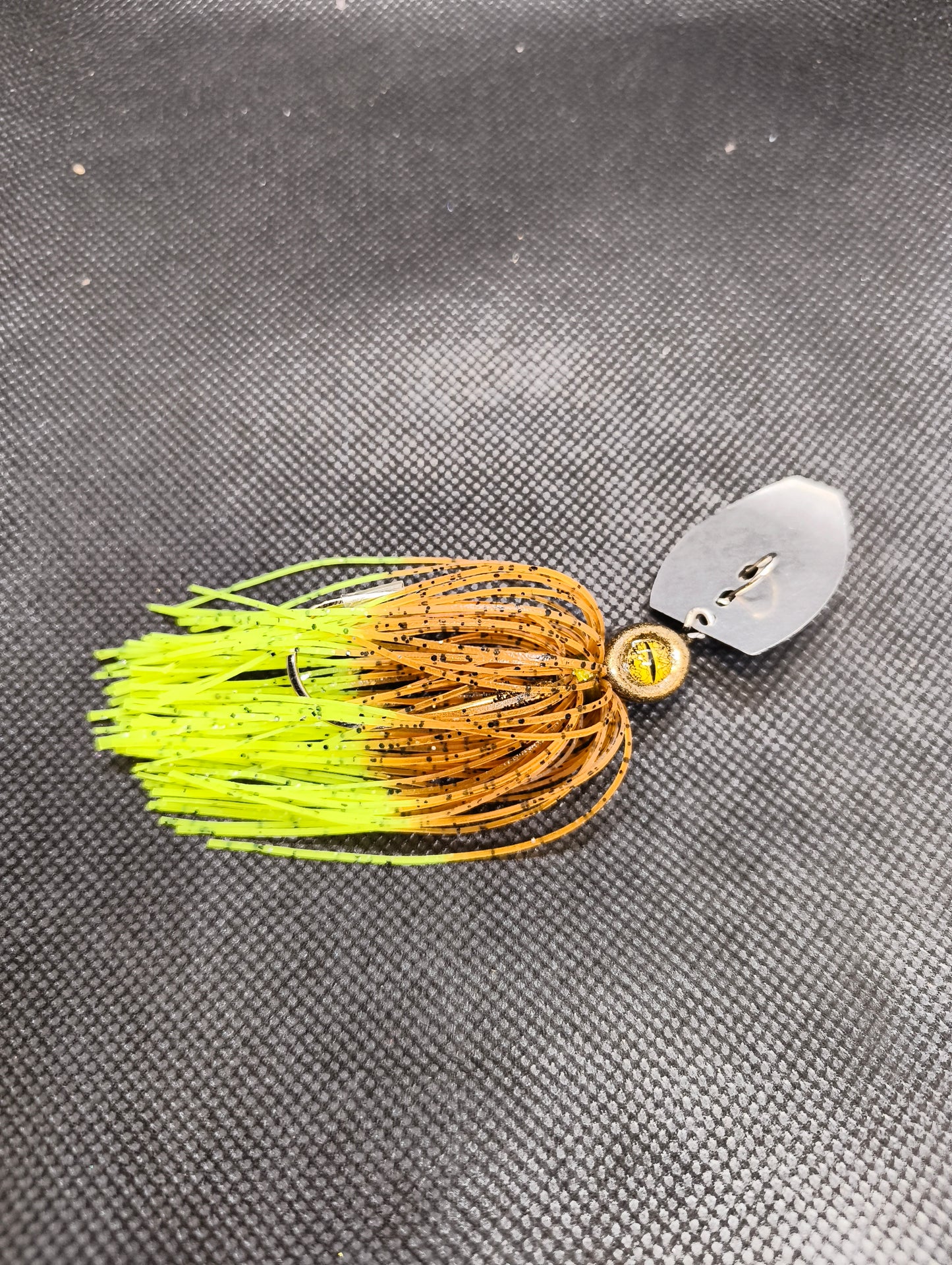 Limestone Softbaits ShadShaker chatter fishing lure with a sleek shad design and vibrant color for freshwater fishing.