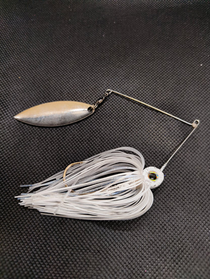 Limestone Softbaits Shadshaker Spinner with shiny blades and soft shad body for fishing lures, vibrant colors, and realistic design.