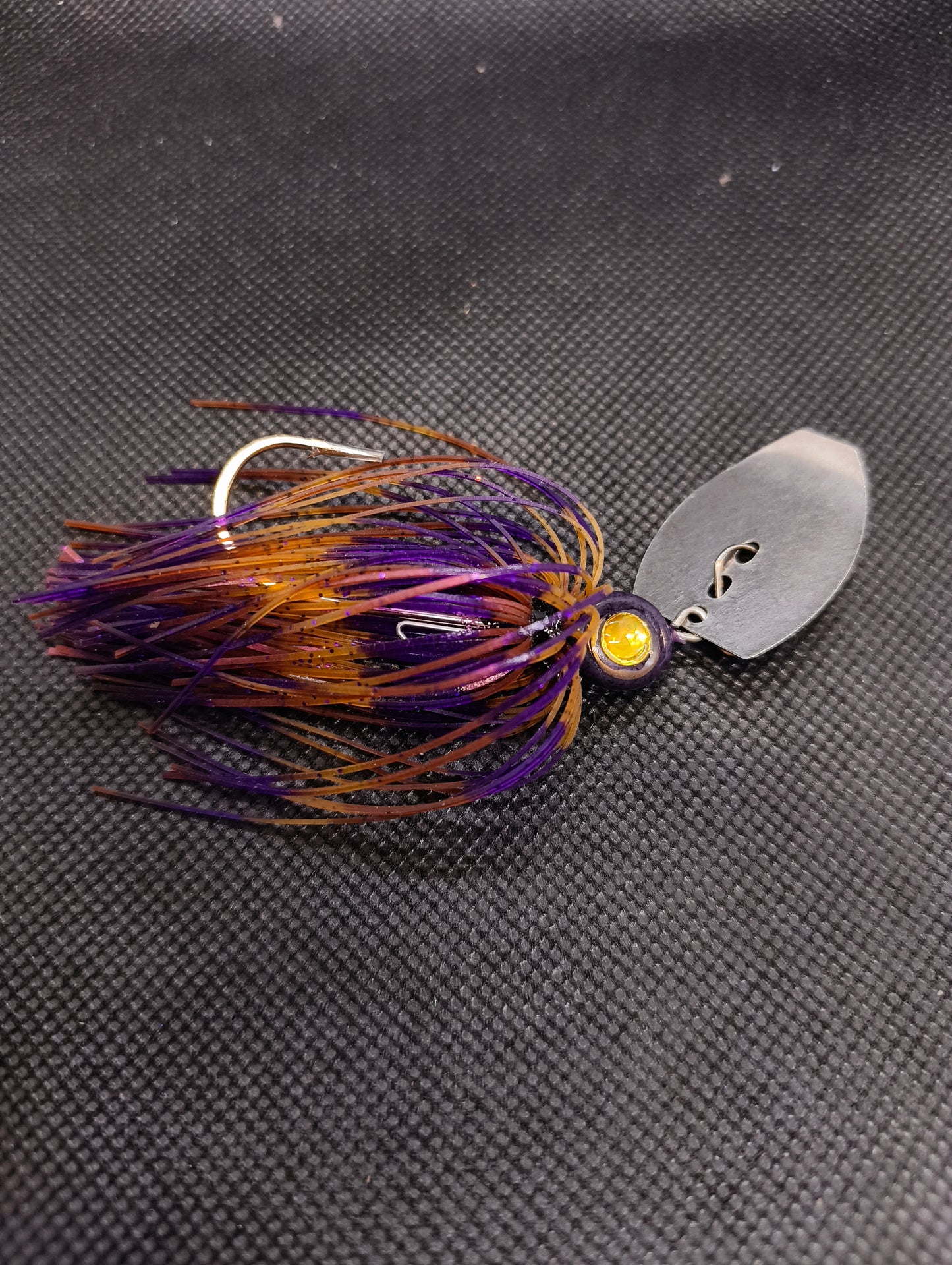 Limestone Softbaits ShadShaker chatter bait with a sleek shad design, ideal for fishing lures and attractively detailed for catching fish.