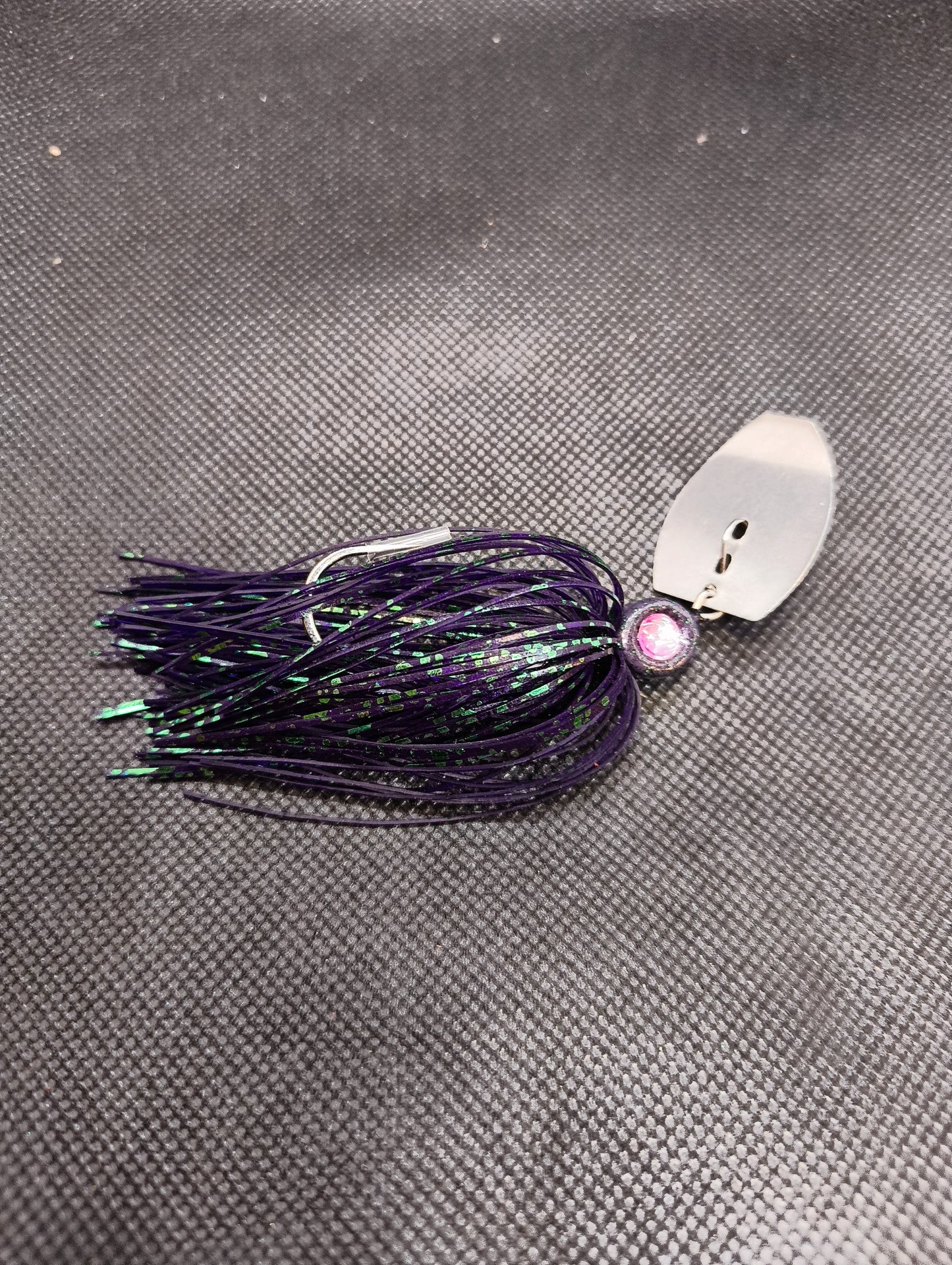 Limestone Softbaits ShadShaker chatter bait with a black and blue soft plastic shad lure attached to a fishing jig head.