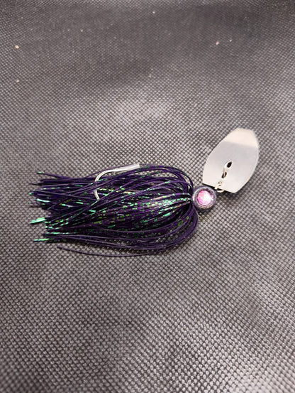 Limestone Softbaits ShadShaker chatter bait with a black and blue soft plastic shad lure attached to a fishing jig head.