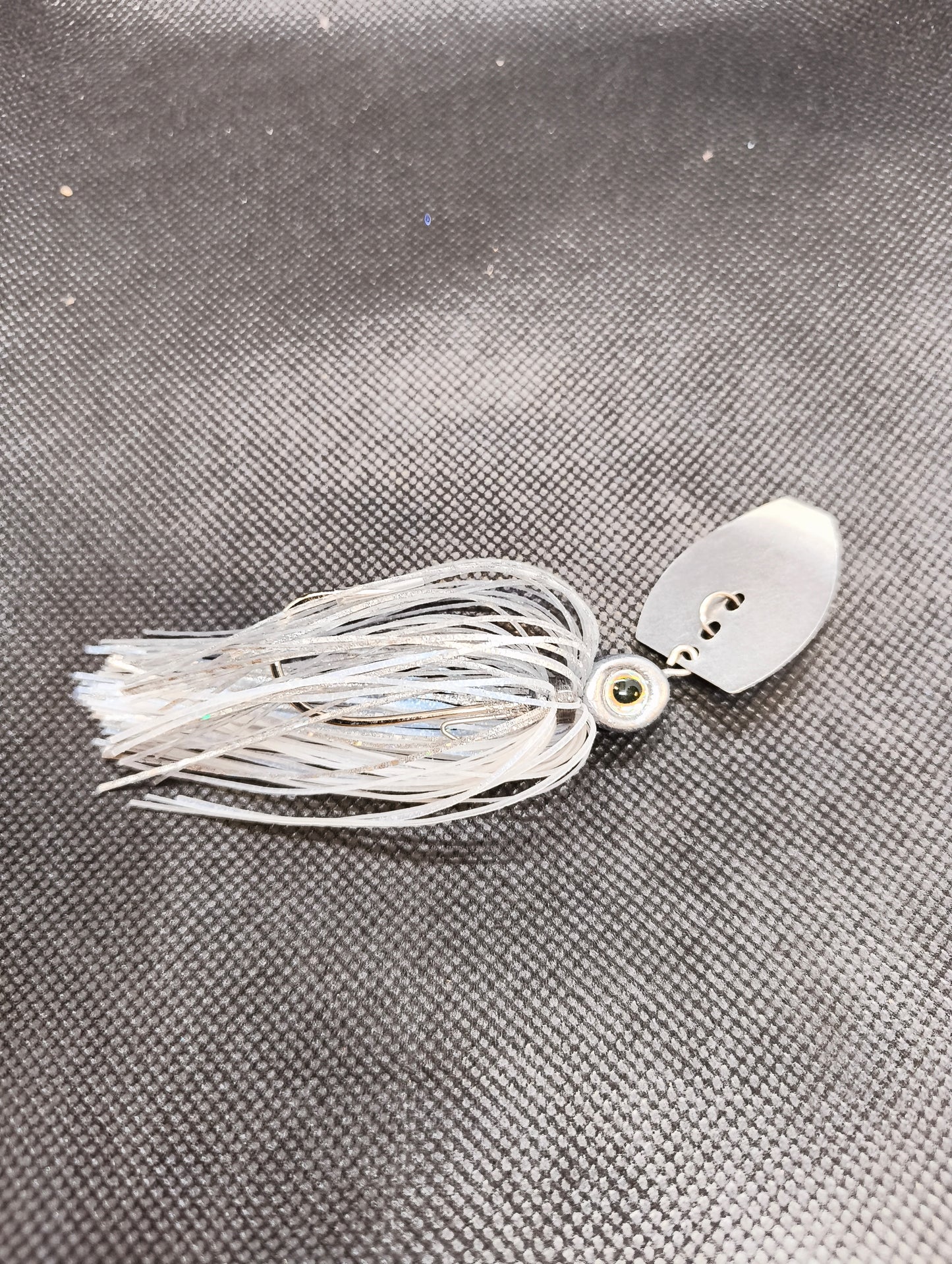 Limestone Softbaits ShadShaker chatterbait with green and black jig head, designed for fishing and bass lure fishing.
