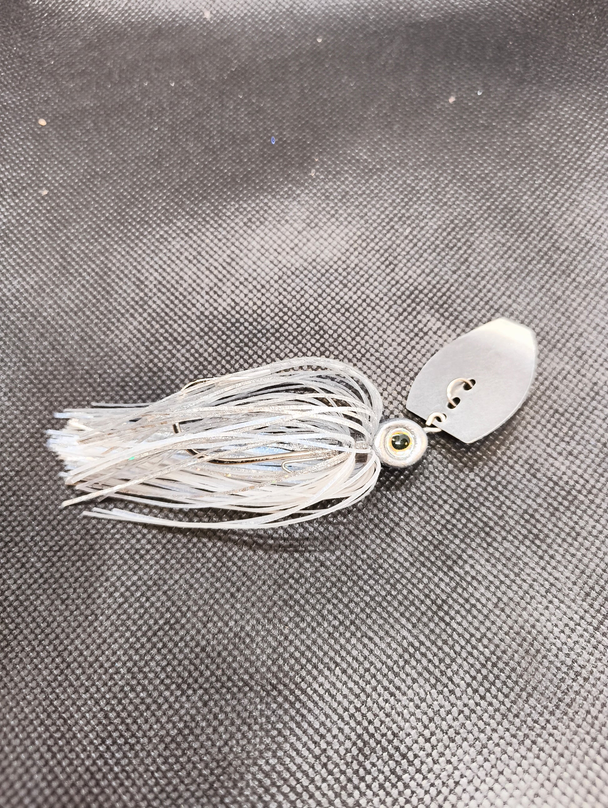Limestone Softbaits ShadShaker chatterbait with green and black jig head, designed for fishing and bass lure fishing.